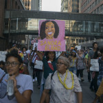 Image of march to honor Sandra Bland and protest deaths of black women in police custody taken July 31, 2015 by Fibonacci Blue, originally posted on Flickr.